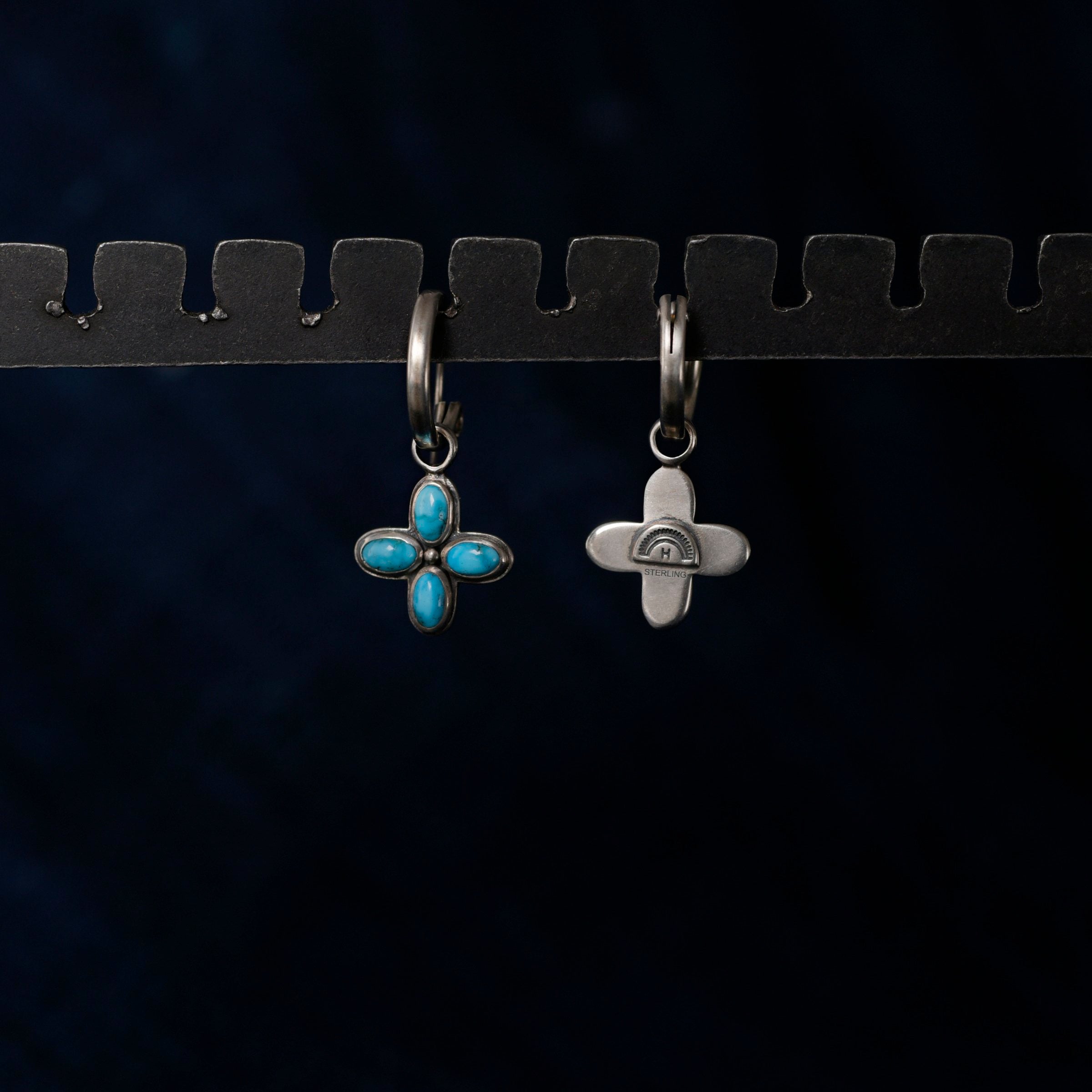 Single sided sterling silver flower petal earrings from New Mexican artist Dennis Hogan. Featuring Blue and Green Turquoise and Jet stones.